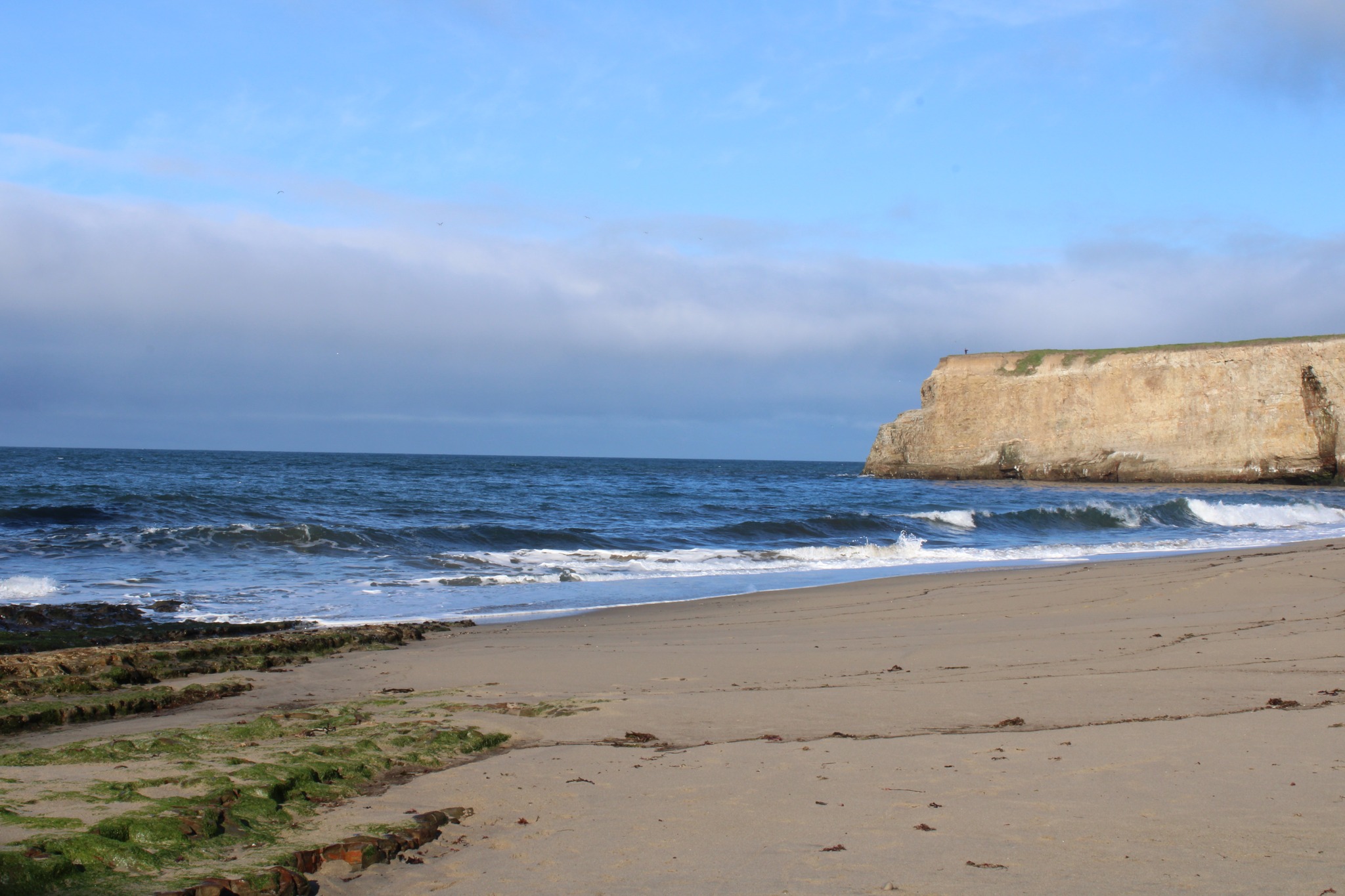 Sandy beach with limestone cliffs, Pacific